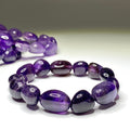 Amethyst Jelly Bean Crystal Bracelet: 10mm Gemstone Beaded Stretch Bracelet
